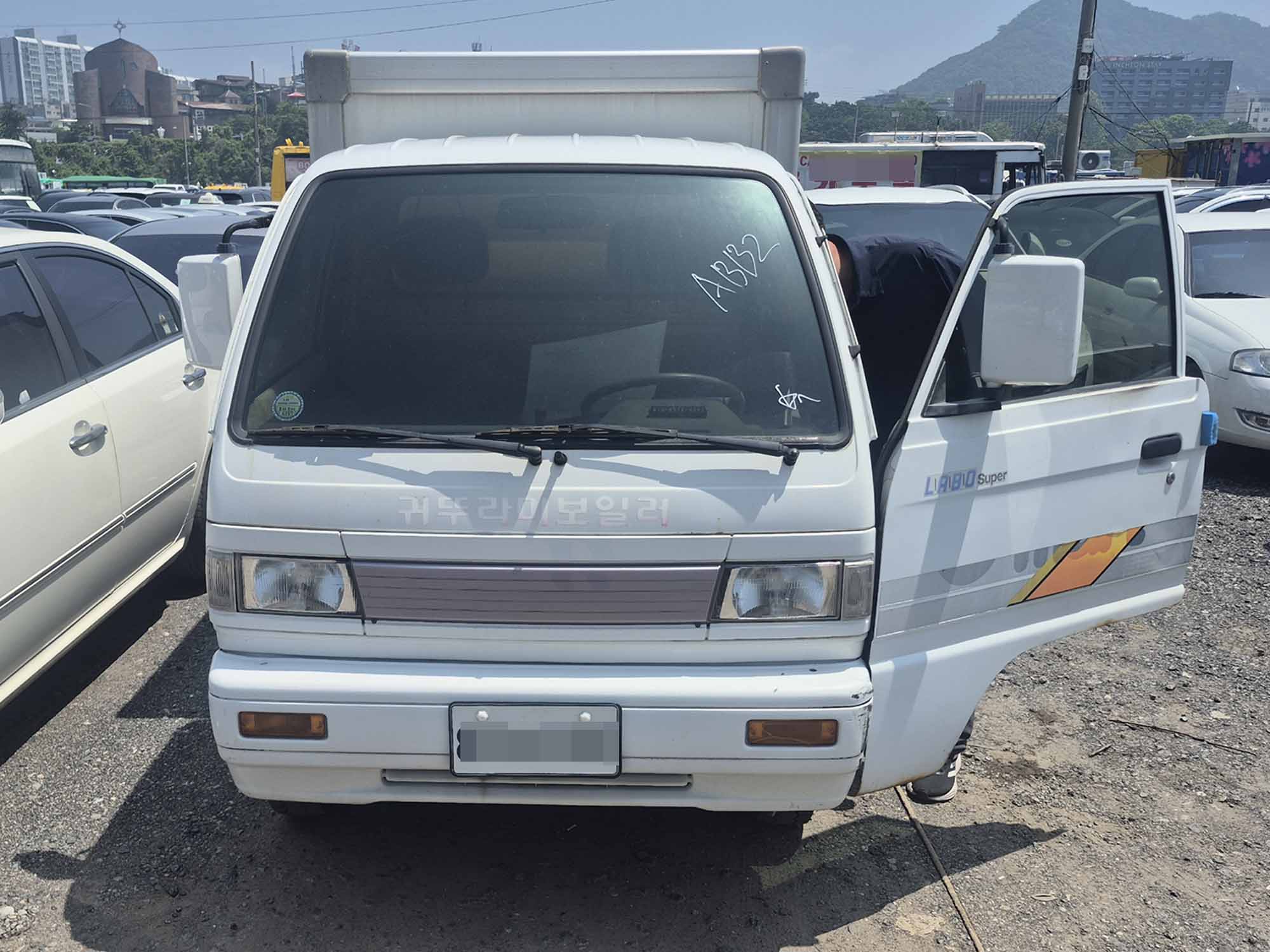 라보 흰색 내장탑 수동 LPG 정면 전면 앞면